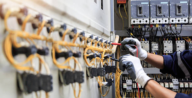 Professional Electrician technician working in Huntsville, AR